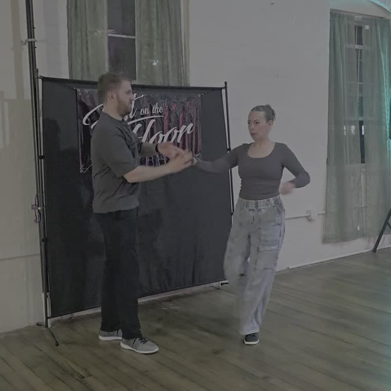 Matt and Desirae demonstrating West Coast Swing partner connection
