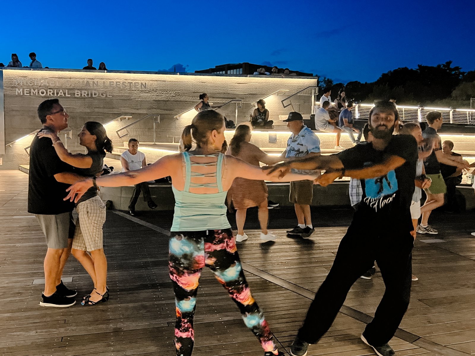 Evening bridge social under lights